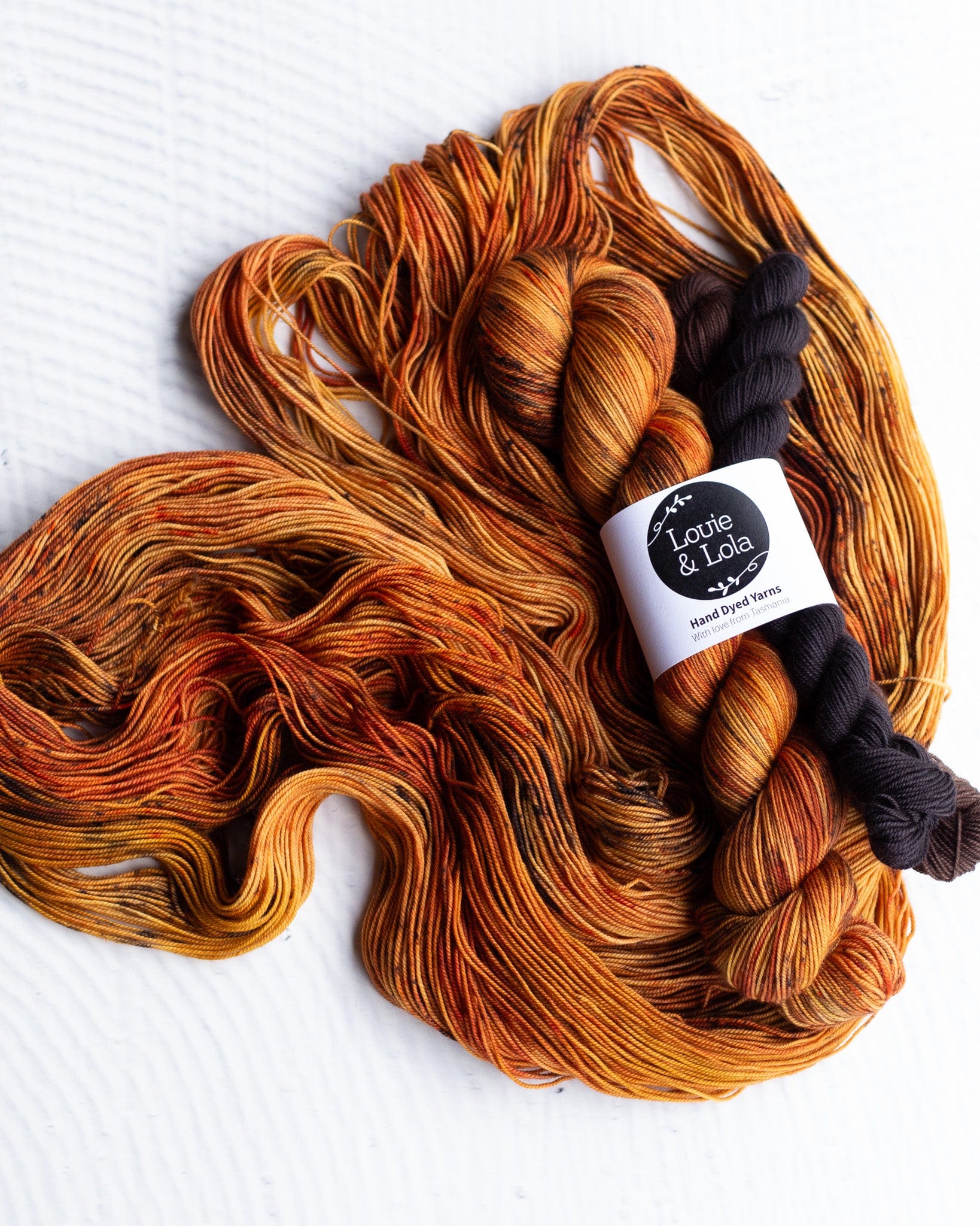 Louie & Lola Yarns Yarn Club Flock & Feather Yarn of the Month - February 2025 - Gold Laced Wyndotte